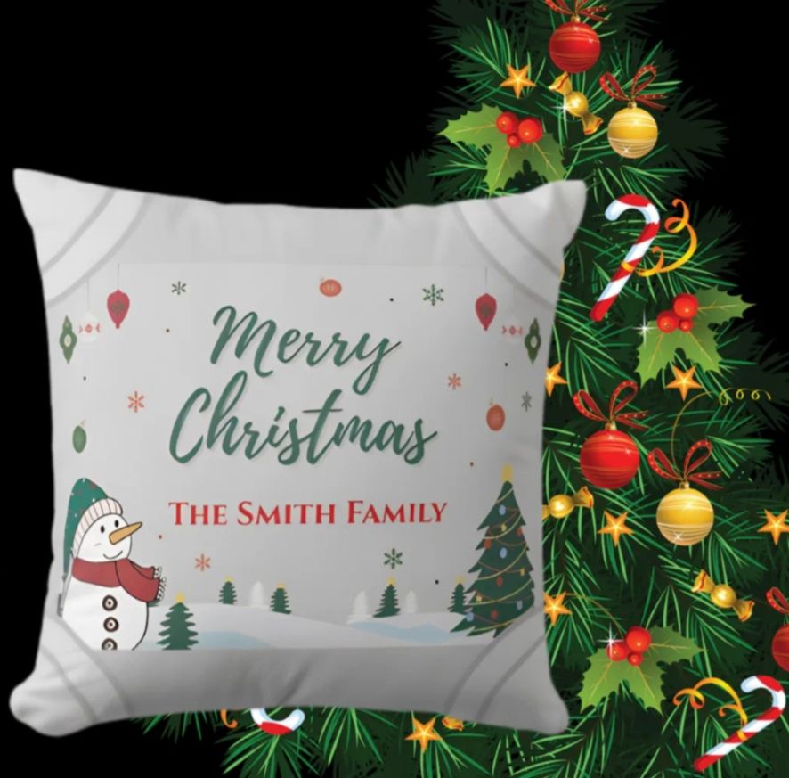 Snowman Christmas throw pillow with personalized family name and festive holiday elements