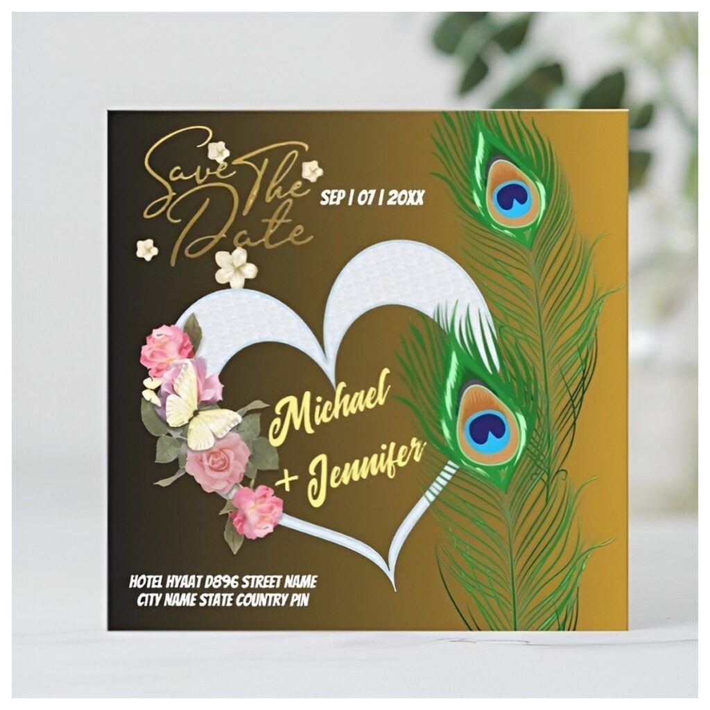 Peacock Feather Floral Save the Date Card featuring vibrant peacock feathers, pink roses, gold typography, and a heart-shaped design.